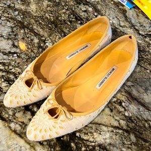 Ivory eyelet Manolo Blahnik flats. Size 37 1/2. Worn condition, but classic!